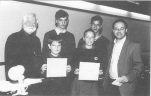 Two pupils from St Bedes Primary School, two students from Winchester College Community Service, David Rock and Laurence Wolff art teacher and head of Winchester College Community Service