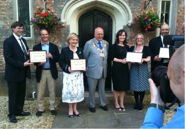 Winners being photographed with the Mayor
